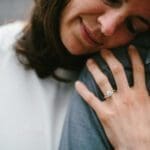 Embrace not Hug Embrace - Two tone on a hand.